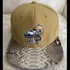 Just Don Saints Snap back, Snake Skin Brim and Tan in color